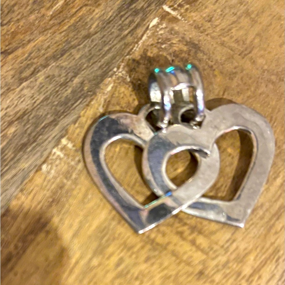 Dije doble corazón real silver